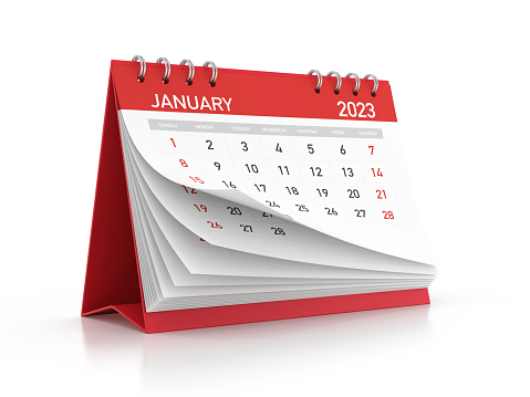 2023 January monthly calendar standing on a reflective background. Isolated on white background. Clipping path.