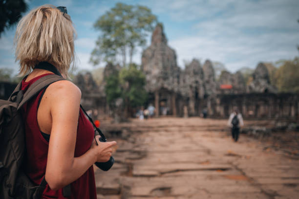 istock A woman exploring the temples at the Angkor Wat complex 1447548472