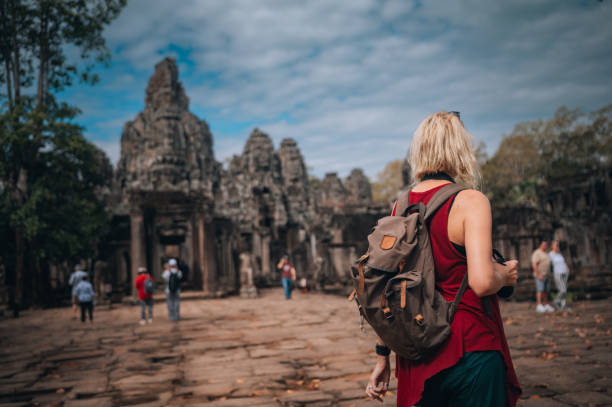 istock A woman exploring the temples at the Angkor Wat complex 1447549576