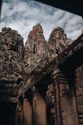 Bayon Temple in Cambodia on a cloudy  day, in the Angkor temple complex in Cambodia.