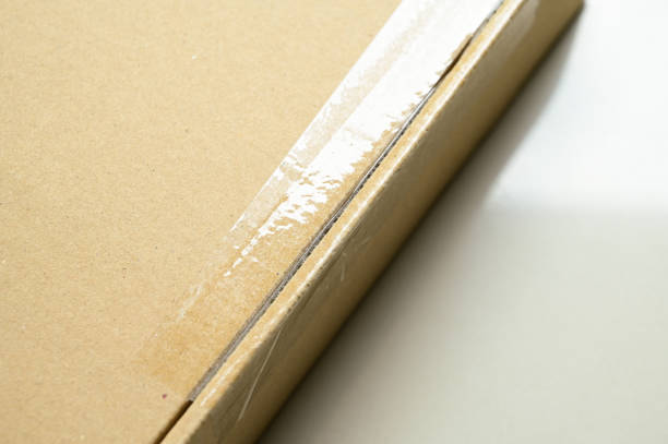 istock brown box packaging for shipping, paper textured 1447553605