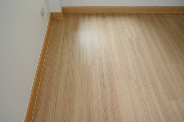 istock wooden floor and white wall, construction industry 1447553789