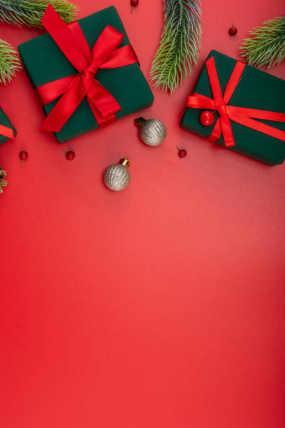 istock Christmas composition. Festive decor on red background. Copy space, flat lay, top view. 1447554551