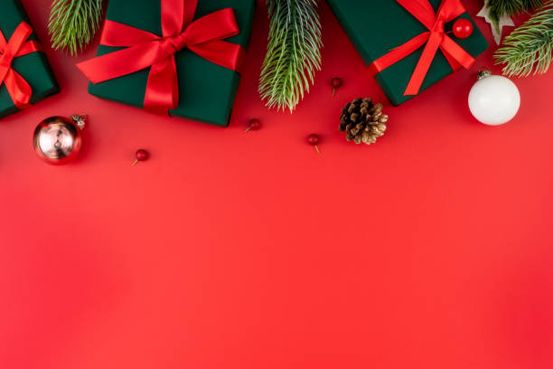 istock Christmas composition. Festive decor on red background. Copy space, flat lay, top view. 1447554584