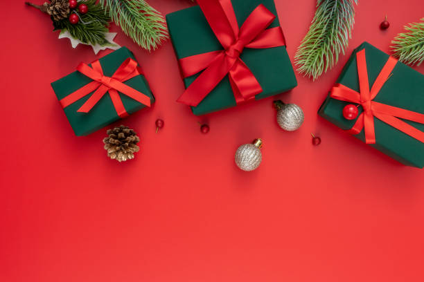 istock Christmas composition. Festive decor on red background. Copy space, flat lay, top view. 1447554591