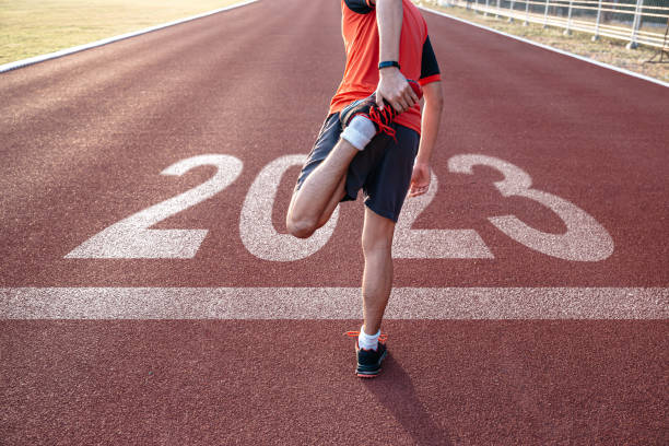 istock Young man runner waiting to prepare for 2023 goals. 1447559429