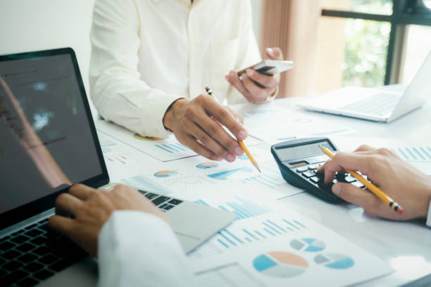 istock Startup asian business teamwork concept discussing graphs showing the results. 1447559484