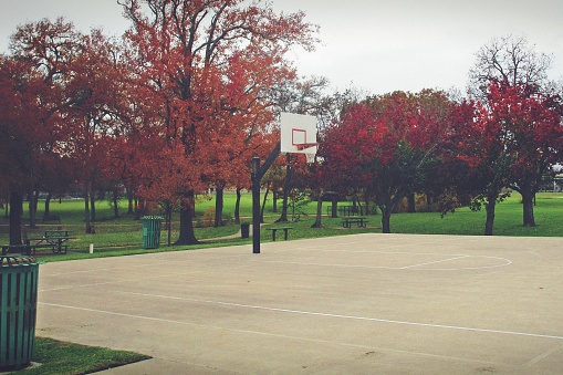 This basketball court at a public park in central Texas was serenely empty on an overcast autumn afternoon.