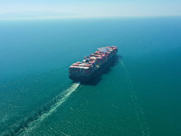 istock Aerial view of a loaded container cargo ship. drone view 1447566334
