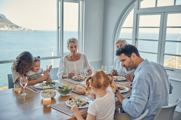 380+ Family Dinner At Beach Stock Photos, Pictures & Royalty-Free
