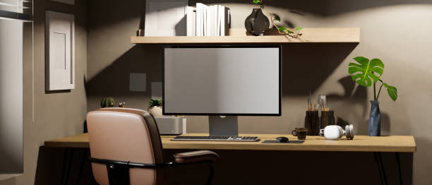 istock Modern workstation with computer mockup, painting tools and accessories on wood table 1447578185