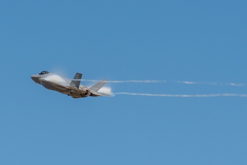 Augusta,Georgia: May 13,2023- A US Air Force jet doing sorties in sky flying a supersonic speed.