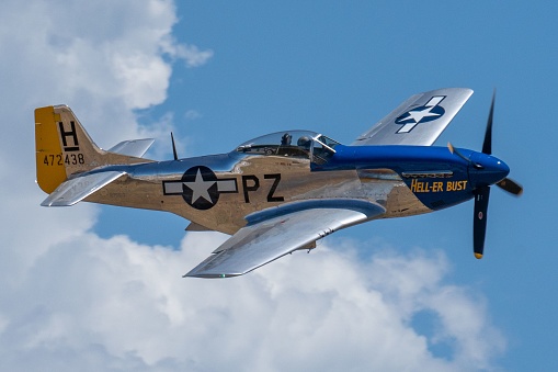 Layton, United States – June 25, 2022: The P-51 Mustang Performing Aerobatics at Hill AFB in blue sky