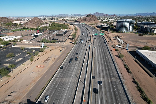 An aerial view of cars driving on a highwa