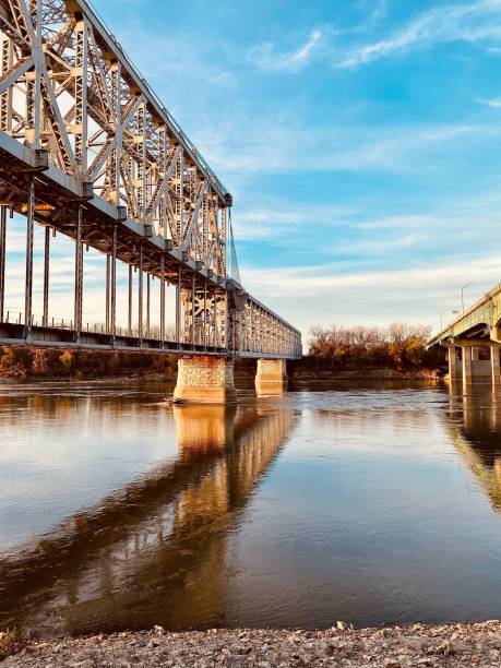 istock Vertical shot of a bridge under a blue sky 1447586144