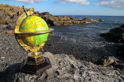 Ancient Vintage Globes Planet Earth near the Atlantic Ocean