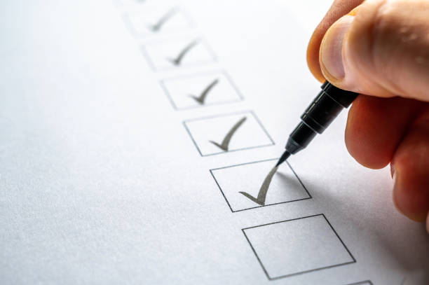 istock Organized processing of tasks with the checking off of a checklist 1447587424