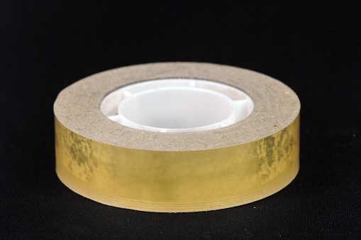 Picture of a tape roll on a dark background