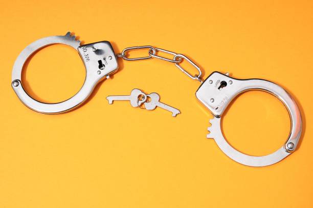 istock Pair of Handcuffs , digital photo image 1447588290
