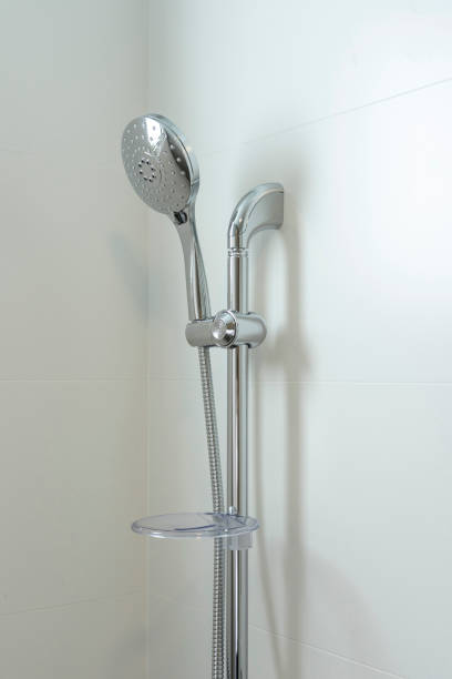 istock stainless steel shower head in new bathroom. 1447589246