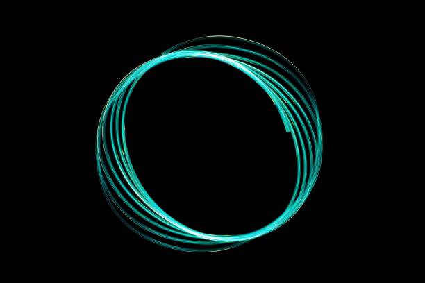 istock Teal neon light swirl illustration against the black background 1447589282