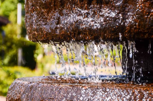 istock Water Dropping From a Fountain , digital photo image 1447590809