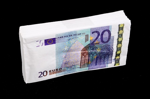 Euro Pile Banknotes Copies over a Black Background