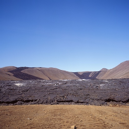 A beautiful view of a mountain landscape with hills under the clear sky