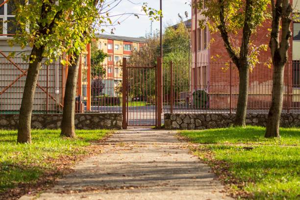 istock Entrance between the park to the school 1447593888