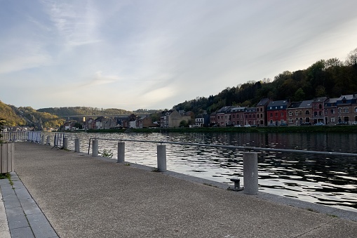 Empty pier alongside the Meuse river in Dinant