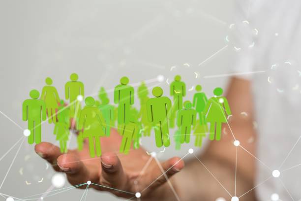 istock Person showing 3d human icons on a blurred background 1447595372