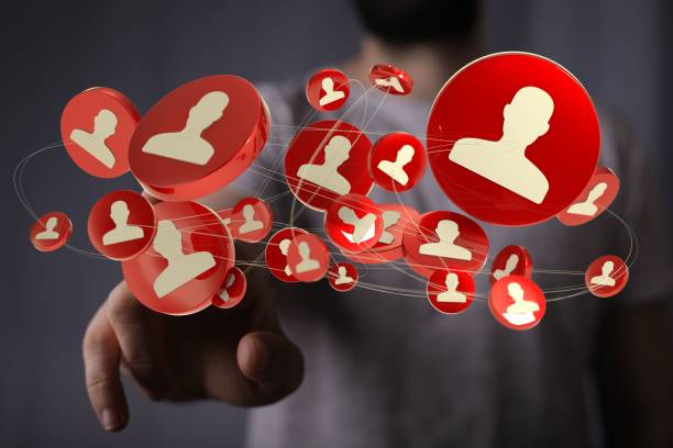 istock Person showing 3d human icons on a blurred background 1447595395