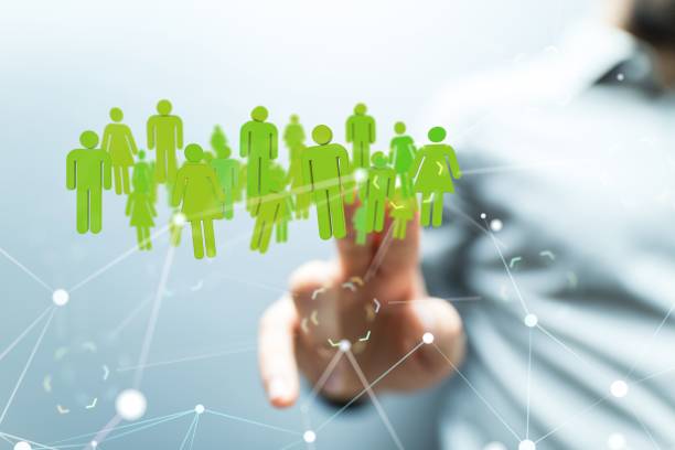istock Person showing 3d human icons on a blurred background 1447595509