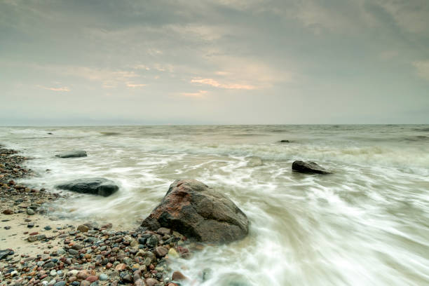 Stones on the beach. Black and white photography.