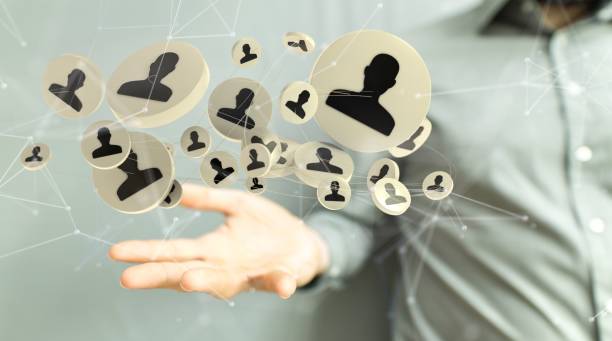 istock Businessman showing a 3D rendered global network icon 1447596413