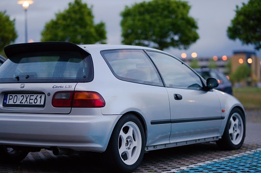 Poznan, Poland – May 21, 2022: A closeup shot of the Honda Civic EG LSi with Spoon spoiler parked outdoors