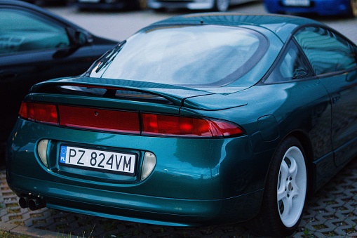 Poznan, Poland – May 21, 2022: The back part of the green Mitsubishi Eclipse