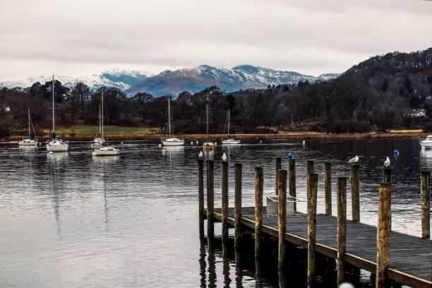 istock Lake with boats and pier 1447598204