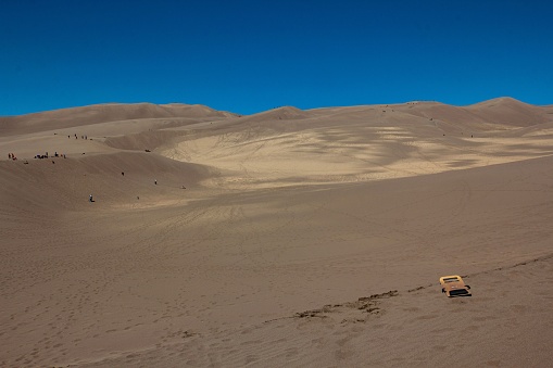 An aerial view of the beautiful brown Sand Dunes National Park in Colorado