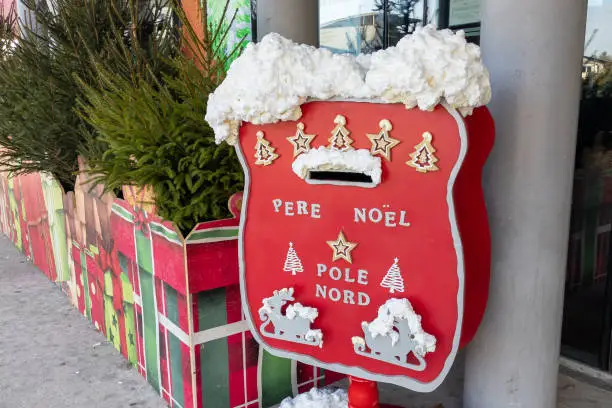 pere noel pole nord french text means santa claus north pole on Mailbox for christmas letters to SantaClaus mail box red
