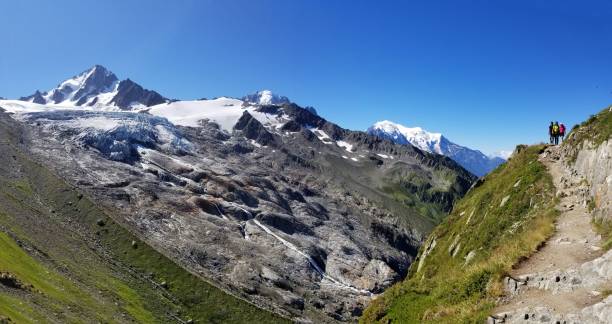 istock Mountain landscape with the top covered with snow 1447605327