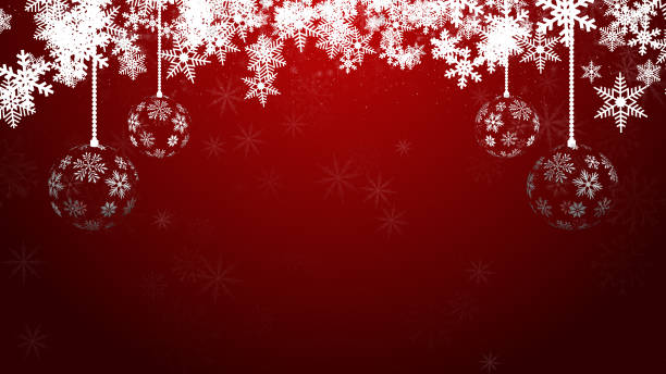 istock Christmas baubles decorations with snowflakes and snow falling on red background 1447606261