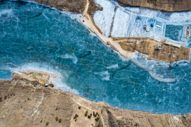 istock Mountains and frozen lakes in winter 1447607951
