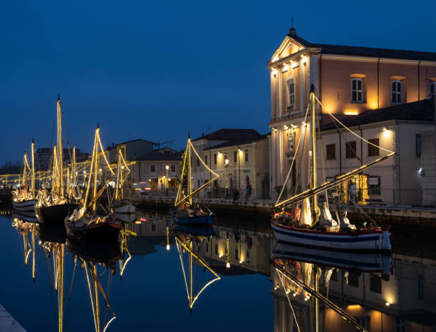 Cesenatico, Forli-Cesena Province, Italy. December 07, 2022. The floating nativity scene of Cesenatico navy is a truly evocative sight. The illuminated boats whose lights are reflected on the water, the approximately 50 life-size statues on the boats, make it an event of great tourist attraction every year during Christmas time.