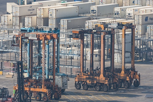 – December 04, 2021: Heavy duty crane in the port of the city. Terex noell sc644e