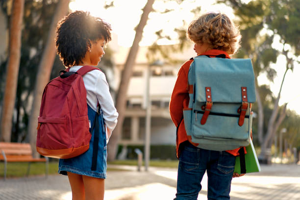 istock School children on the street 1447610452