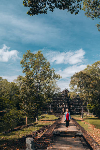 istock Exploring Ancient Ruins of Baphuon Temple, Angkor, Cambodia 1447611420