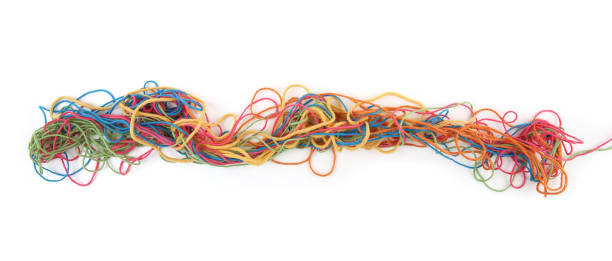 istock Tangled colorful cotton threads isolated on white background. 1447613362