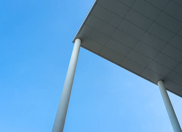istock Low Angle View Of Pole Against Clear Blue Sky 1447614156