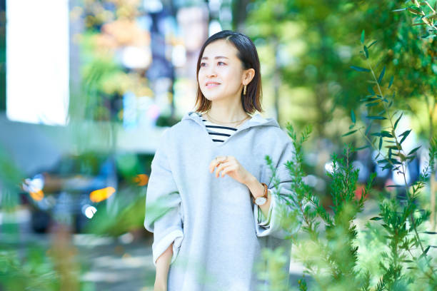 istock A woman walking in the city 1447614366
